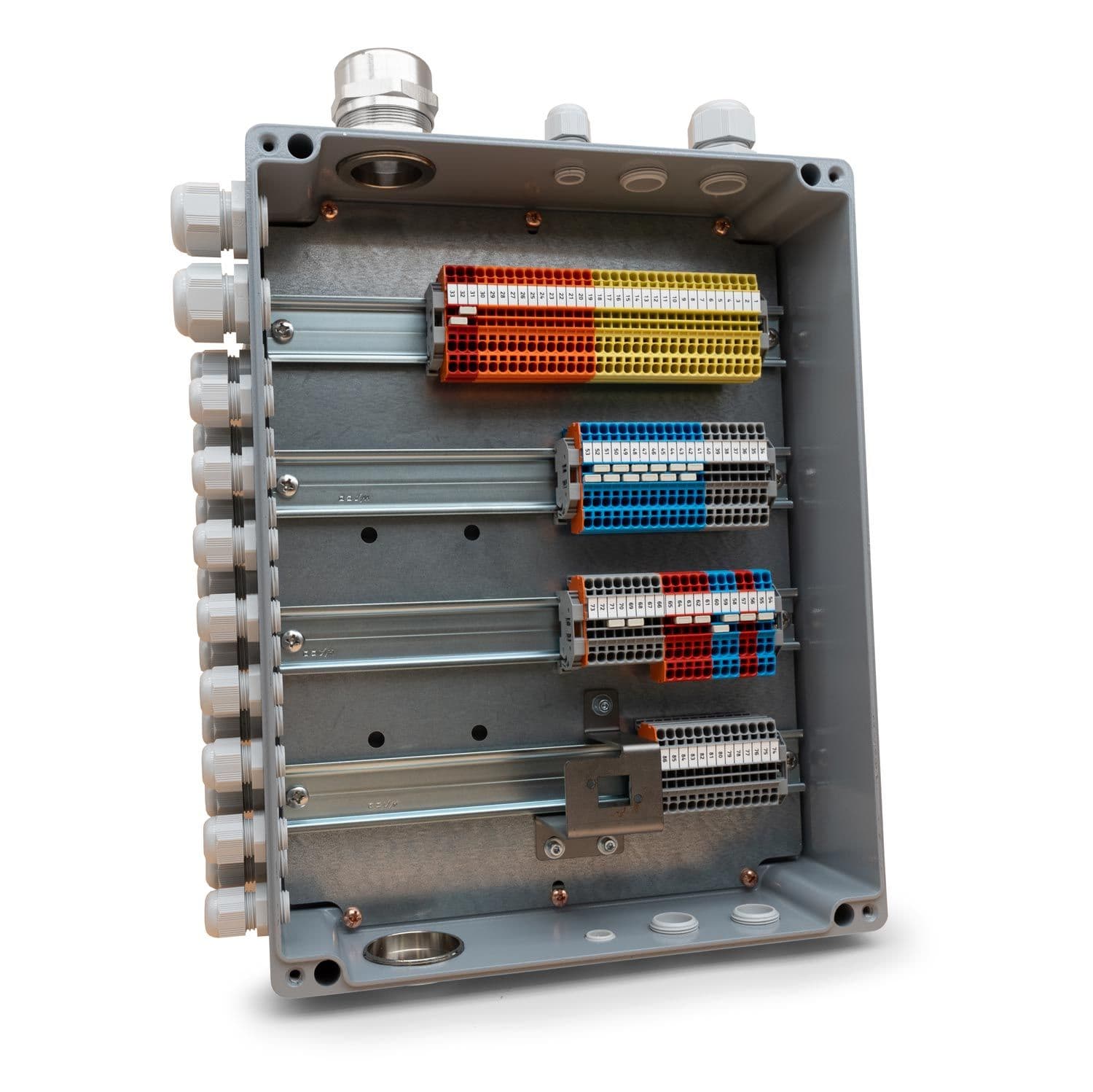 An enclosure with various colored connection blocks, neatly installed on mounting rails.